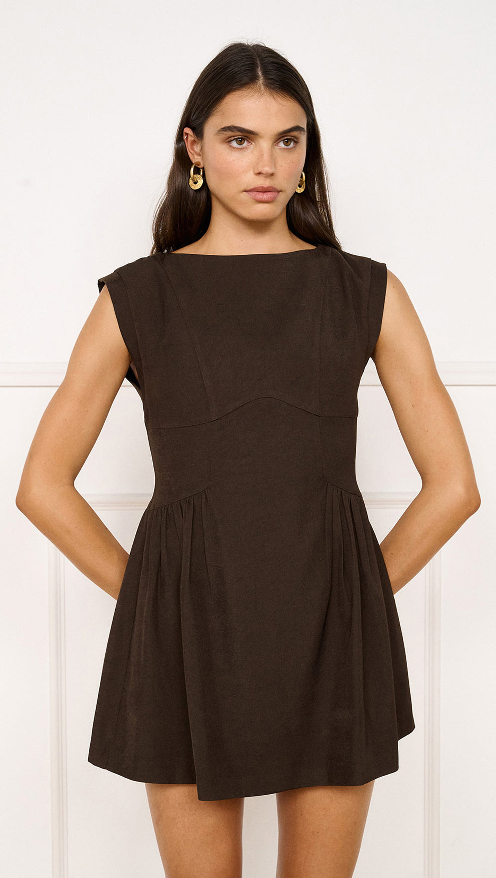 Pleat Waisted Mini Dress in Chocolate featuring a fitted silhouette and gathered skirt.