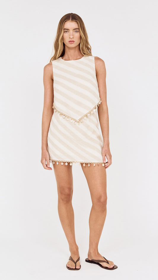 Cotton Linen Blend Tassel Top with Shell Detail worn by a model, featuring striped design and shell trims.