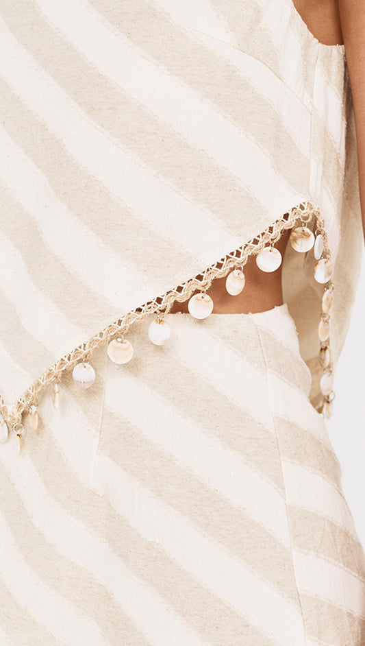 Cotton Linen Blend Tassel Top with Shell Detail featuring side cutout and shell disc trim on a soft diagonal stripe.