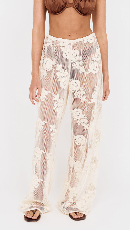 Embroidered Net Relaxed Beach Pant featuring floral embroidery and wide-leg silhouette for stylish beach days.