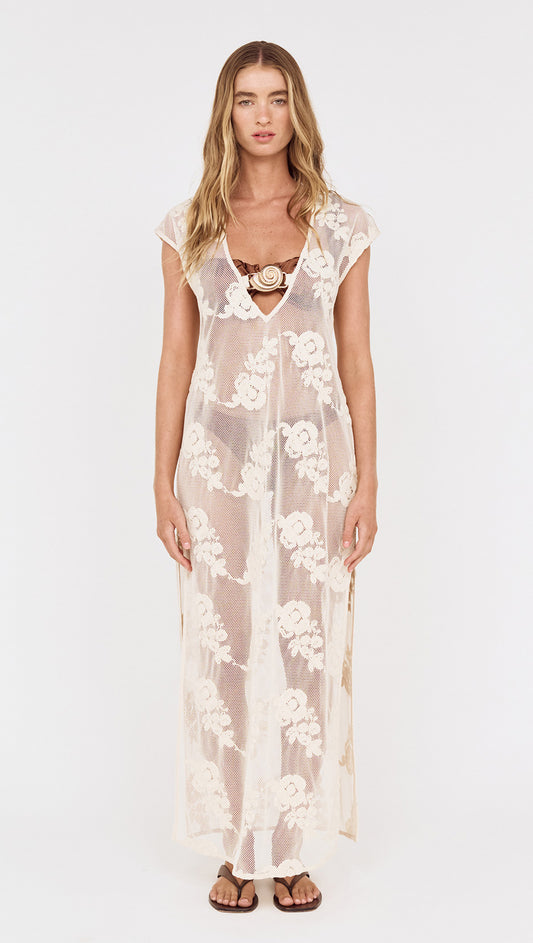 Embroidered Net Maxi Dress with Shell Detail worn by a model, showcasing floral embroidery and a flowing silhouette.