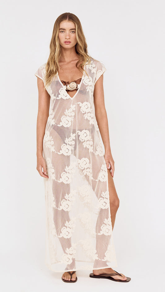 Embroidered Net Maxi Dress with Shell Detail worn by a model, featuring floral embroidery and a side split.