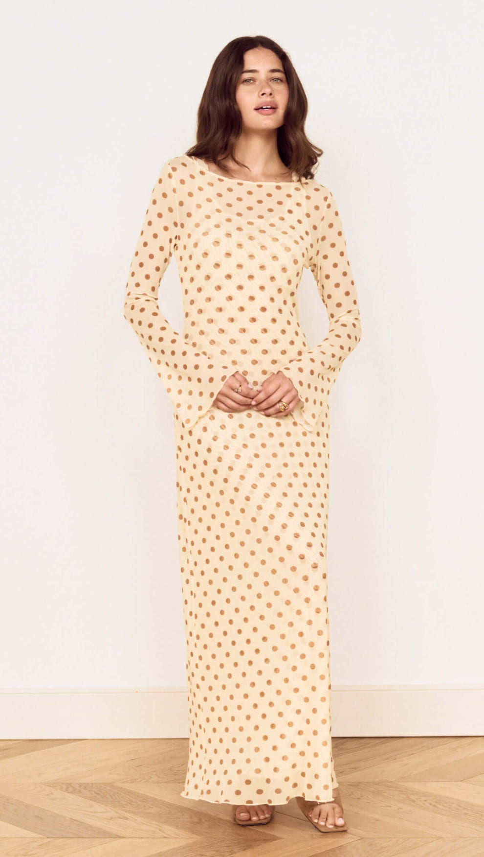 Butter Yellow Polka Dot Midi Dress featuring a boat neckline and flared sleeves in a lightweight fabric.