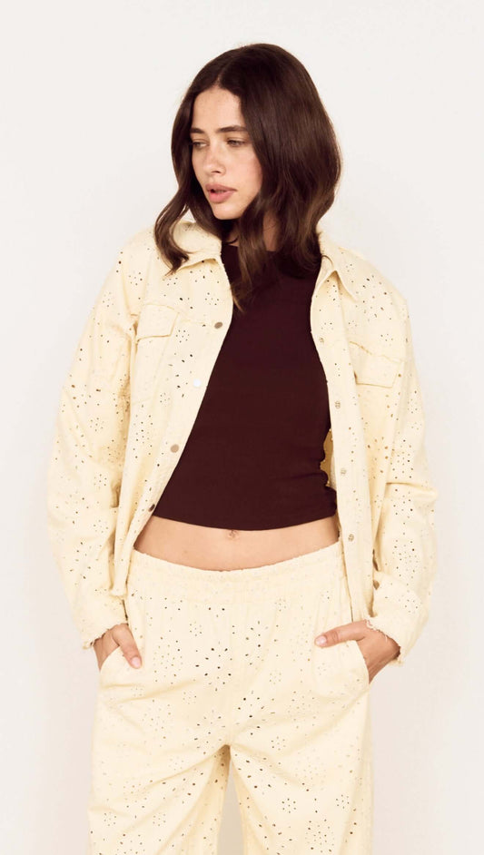 Cotton Denim Broderie Anglaise Jacket worn by a model with a relaxed style and utility-inspired details.