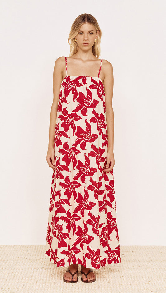 Model wearing a Cotton Maxi Sun Dress in Red Floral with a relaxed fit and adjustable straps.
