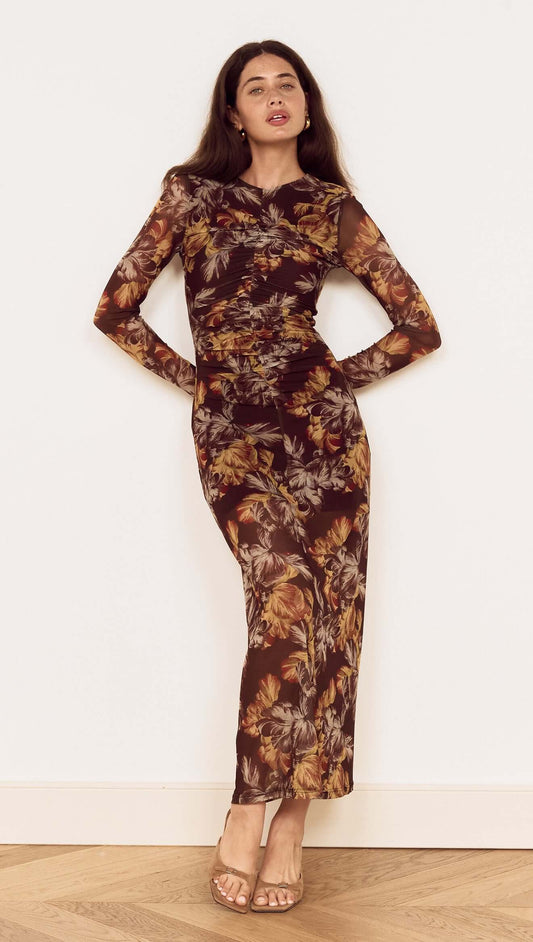 Brown Floral Gathered Mesh Midi Dress worn by a model standing against a neutral background, showcasing elegant floral details.