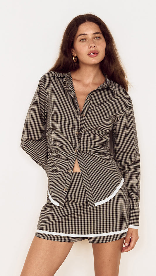 Model wearing Contrast Hem Mini Skirt in Grey Check with matching check shirt, showcasing stylish micro-check design.