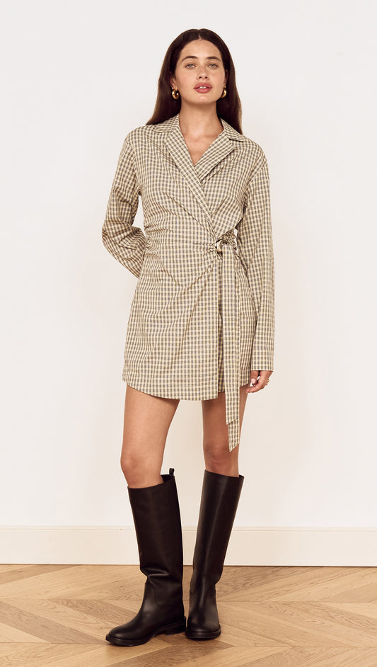 Cotton Wrap Detail Shirtdress in Blue Check worn by a model, showcasing a stylish wrap-front design and knee-high boots.