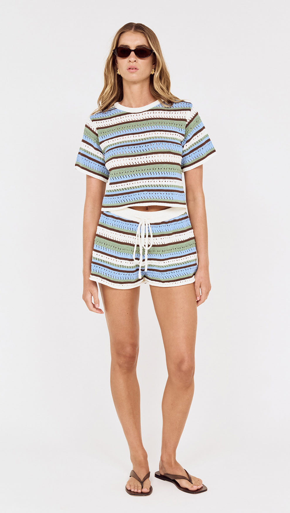 Blue & Green Stripe Crochet Cropped Tee worn with matching shorts, ideal for beach days and warm weather.