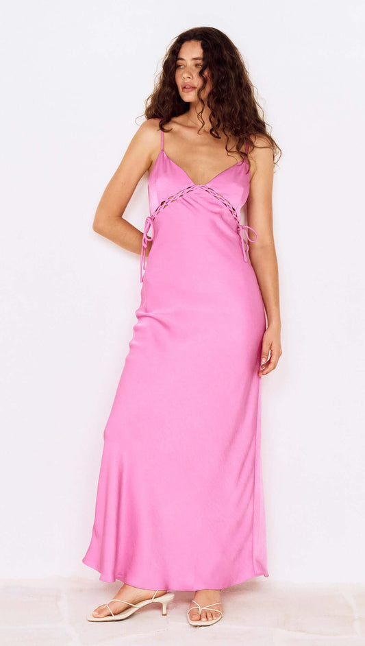 Fuchsia Bias Cut Maxi Dress with Lacing Detail showcased on a model in a stylish pose.