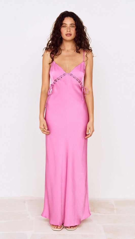 Fuchsia Bias Cut Maxi Dress with Lacing Detail worn by a model, showcasing a stylish and elegant silhouette.