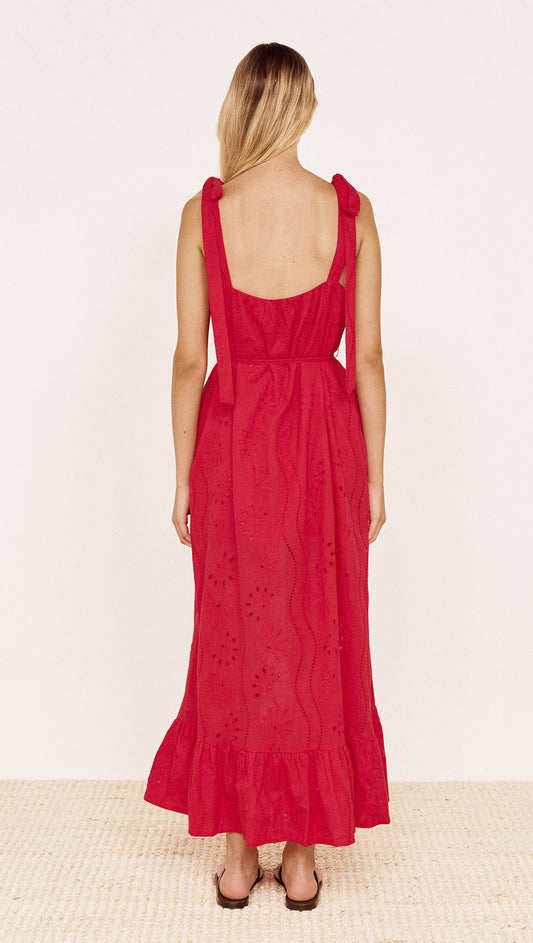 Back view of Cotton Broderie Maxi Sun Dress in Red featuring tie shoulder straps and frilled hem.
