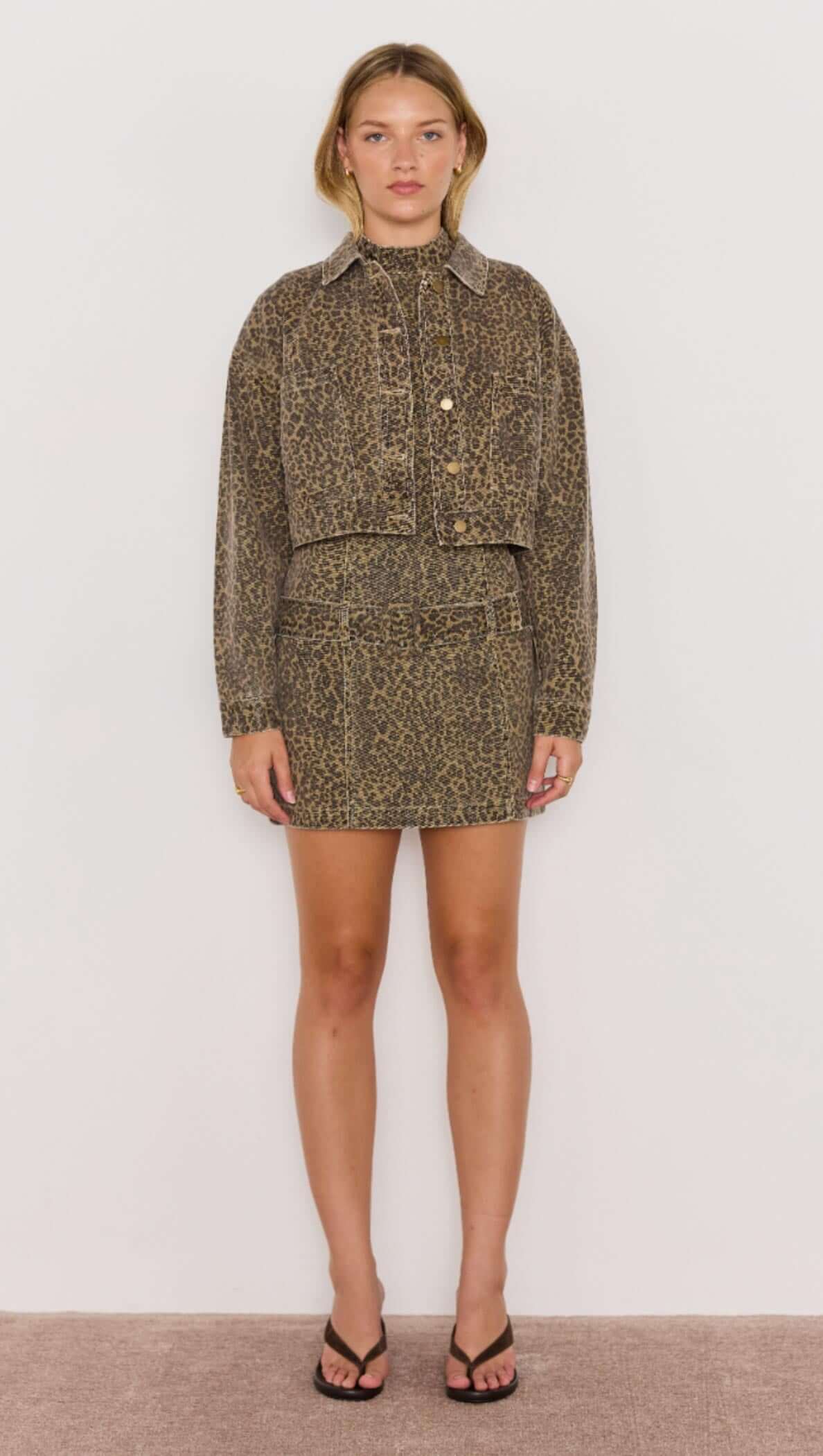 Anouk Mini Dress - Cheetah animal print Denim mini dress, sleeveless with high neck and low waist belt