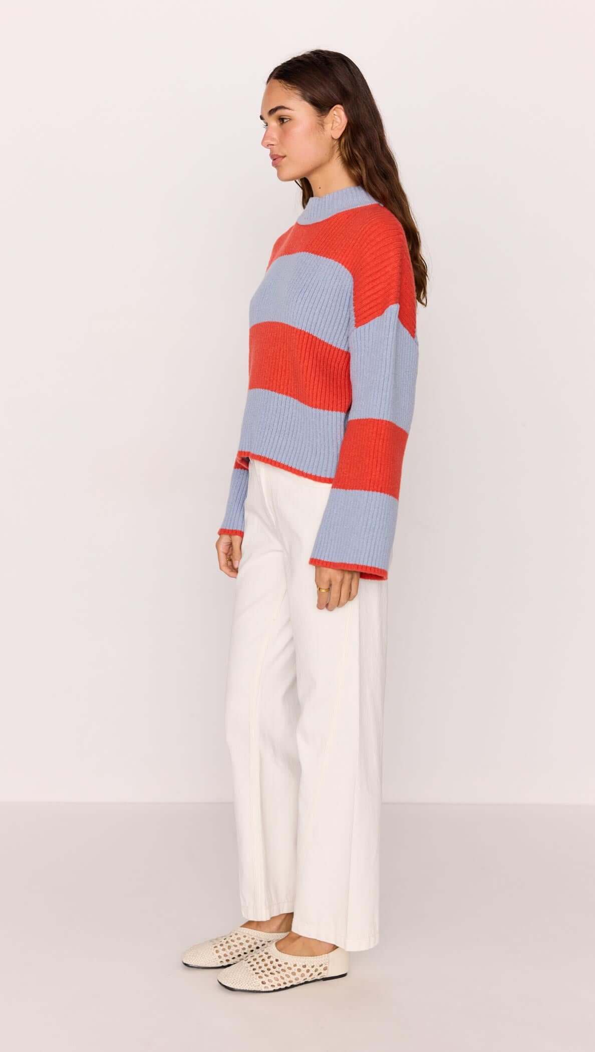 Freja Stripe Chunky Knit in bold red and blue stripes, featuring a relaxed fit and flared sleeves by MINKPINK.