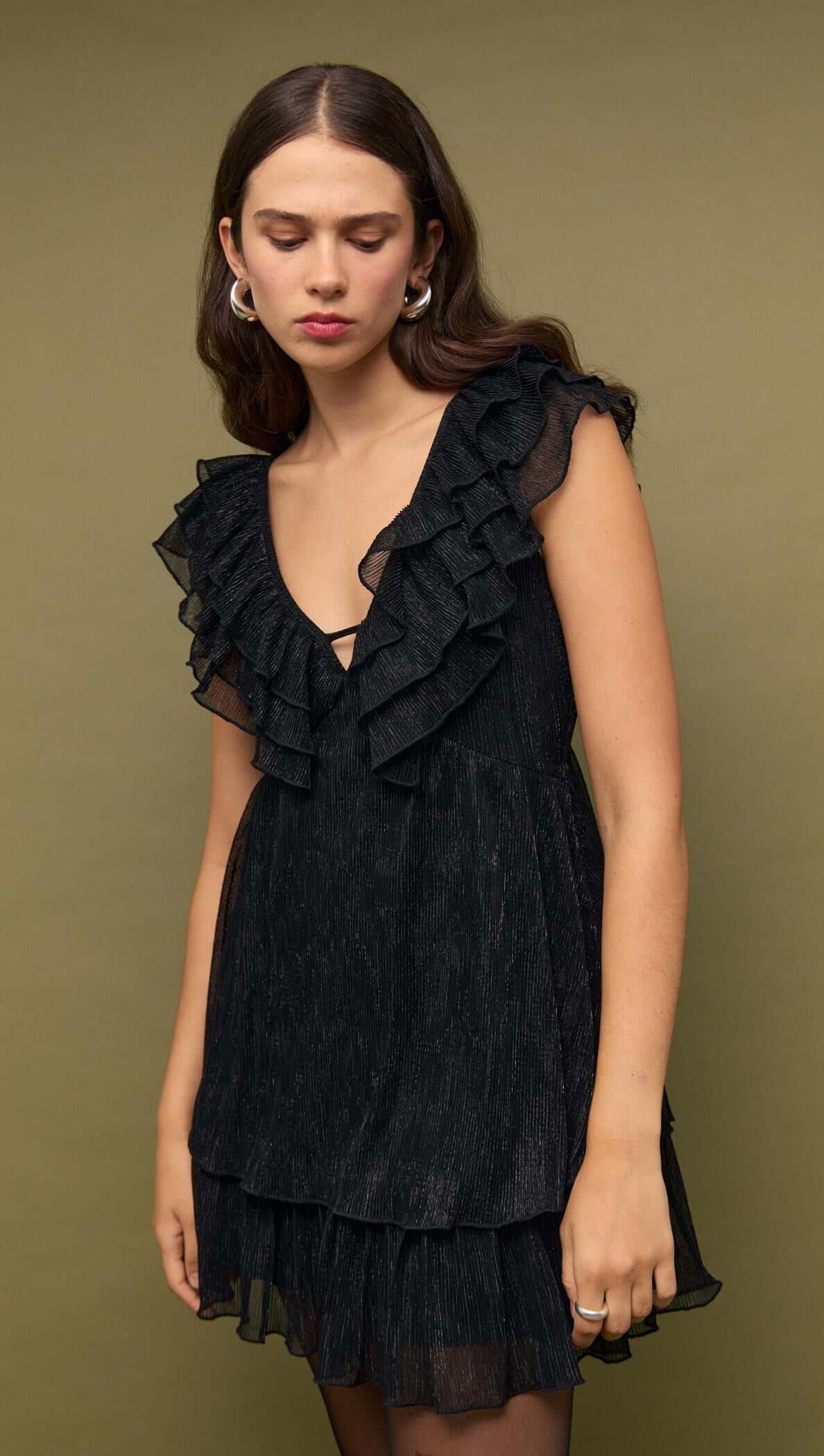 Black Shimmer Plisse Frill Mini Dress with layered ruffles and deep V neckline, perfect for parties.