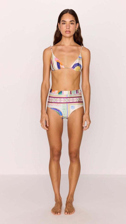 Model wearing a High-Waist Bikini Pant in vibrant multicolour print, showcasing a stylish summer look.