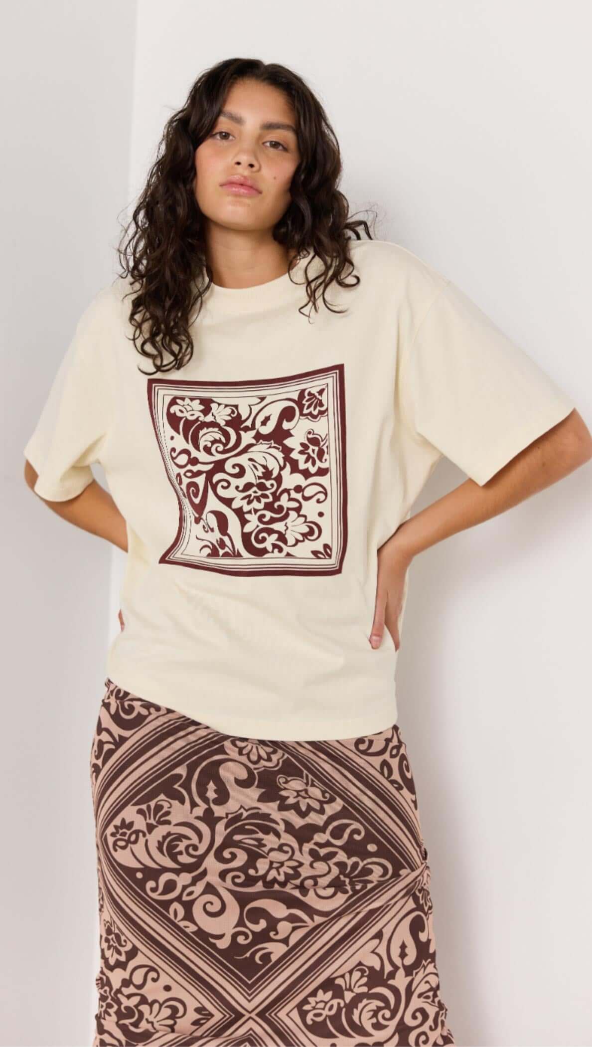 Lumi Oversized Tee - cream T-shirt with brown baroque print. Shot Sleeves.