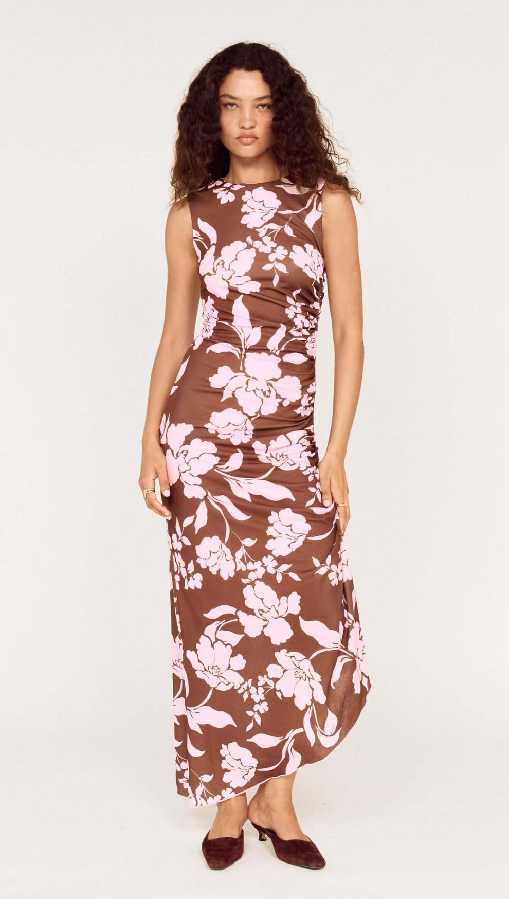 Sleeveless Pink Floral Mesh Midi Dress displayed on a model, featuring oversized floral print and fitted silhouette.