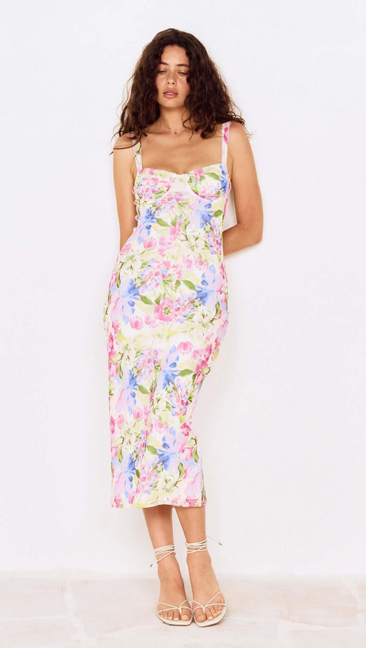 Model wearing a Watercolour Floral Mesh Midi Dress with colorful floral design and a fitted silhouette.