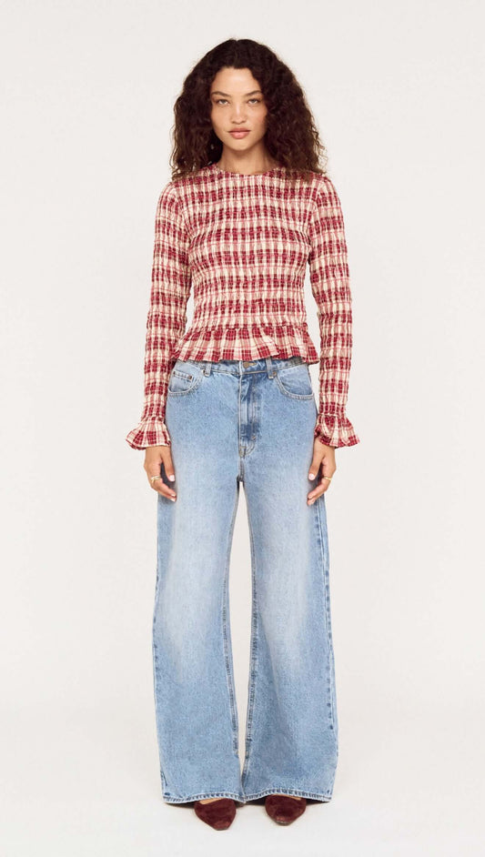 Frill Detail Check Print Shirred Top styled with wide-leg jeans, showcasing a vintage-inspired look and feminine details.