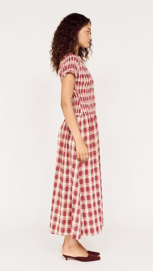 Short Sleeve Shirred Check Midi Dress shown on a model in profile view, featuring a red and white checked pattern.