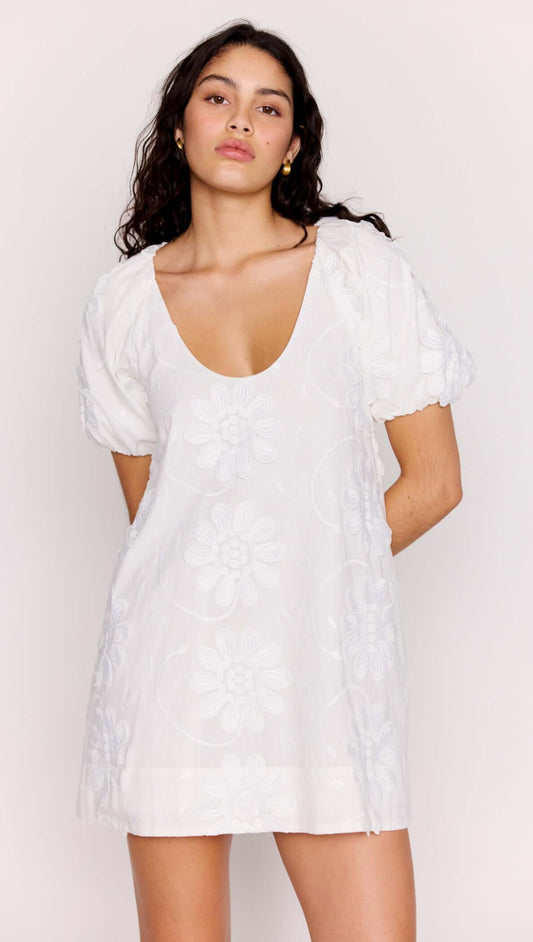 White Cotton Floral Applique Smock Mini Dress with puff sleeves and scoop neckline, perfect for warm-weather dressing.