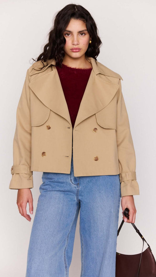 Beige Cotton Drill Cropped Trench featuring wide lapels and double-breasted front, styled with jeans.