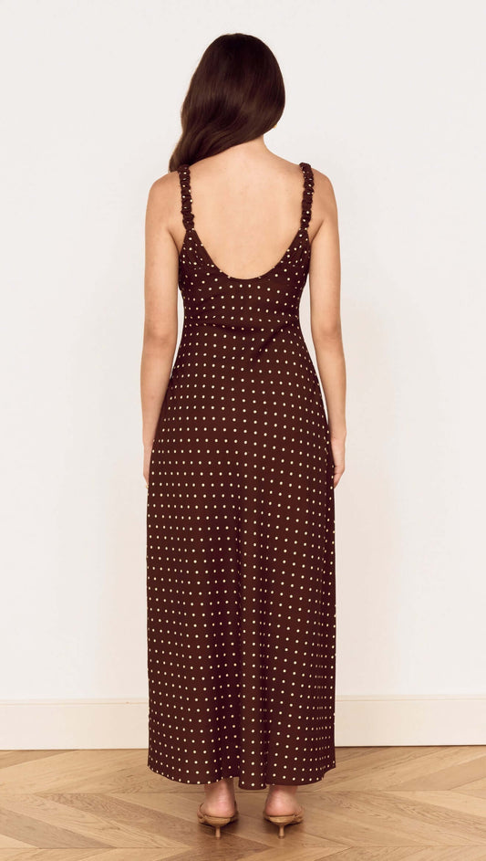 Back view of the Brown Linen Blend Polka Dot Square Neck Midi Dress showcasing its elegant silhouette.