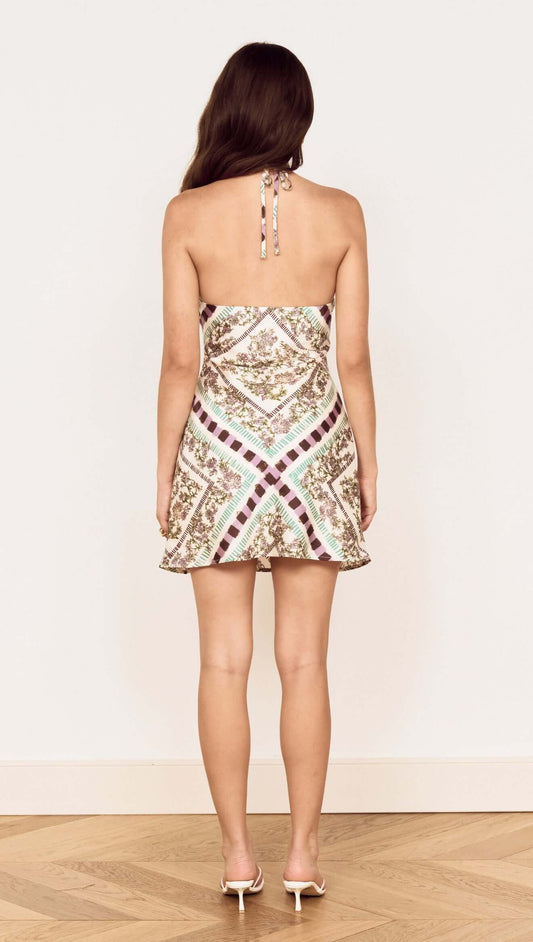 Back view of the Floral Scarf Print Halter Mini Dress showcasing its unique print and adjustable halter tie.