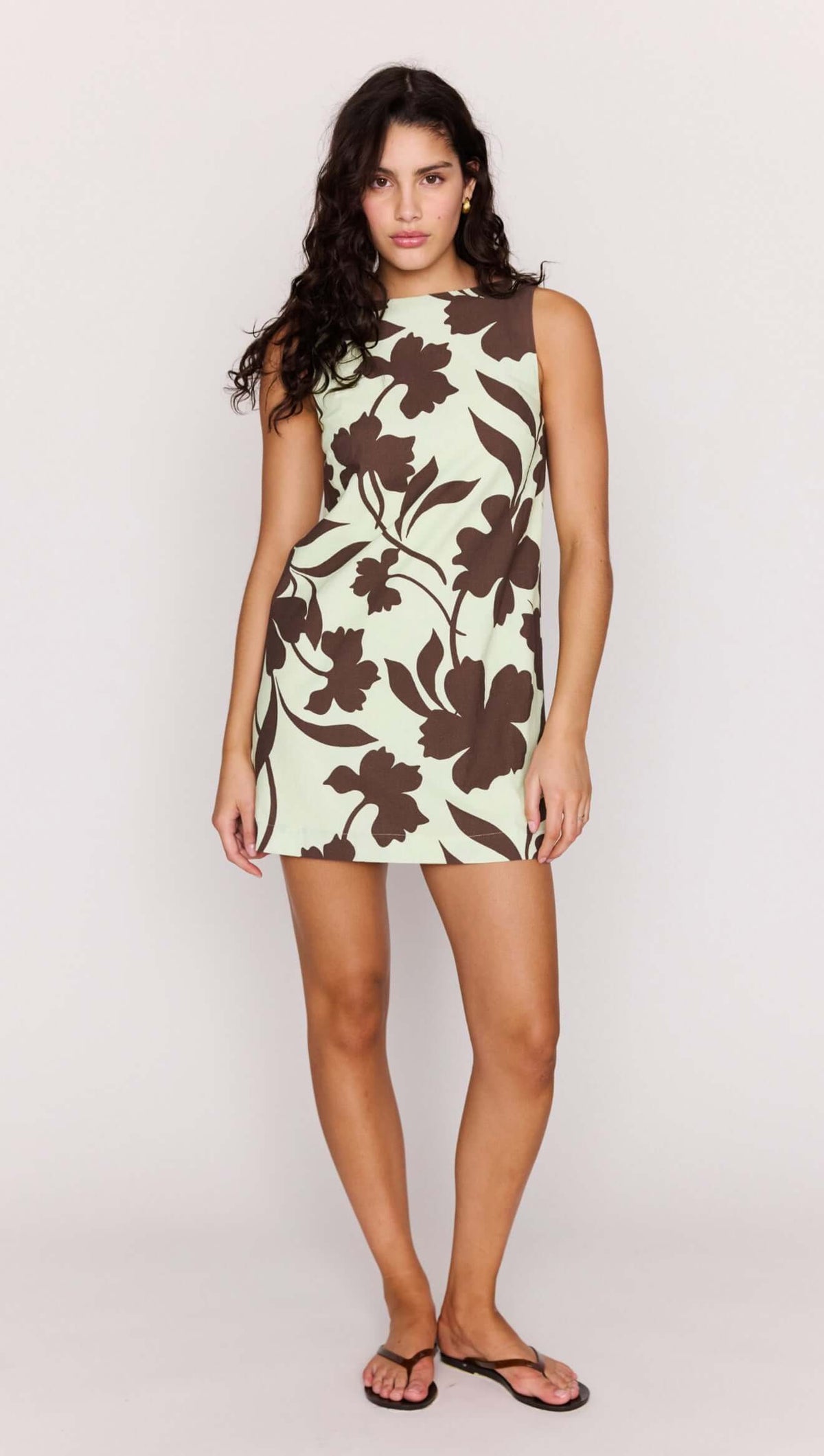 Mint Chocolate Cotton Floral Low Back Shift Dress on a model showcasing its modern floral design.