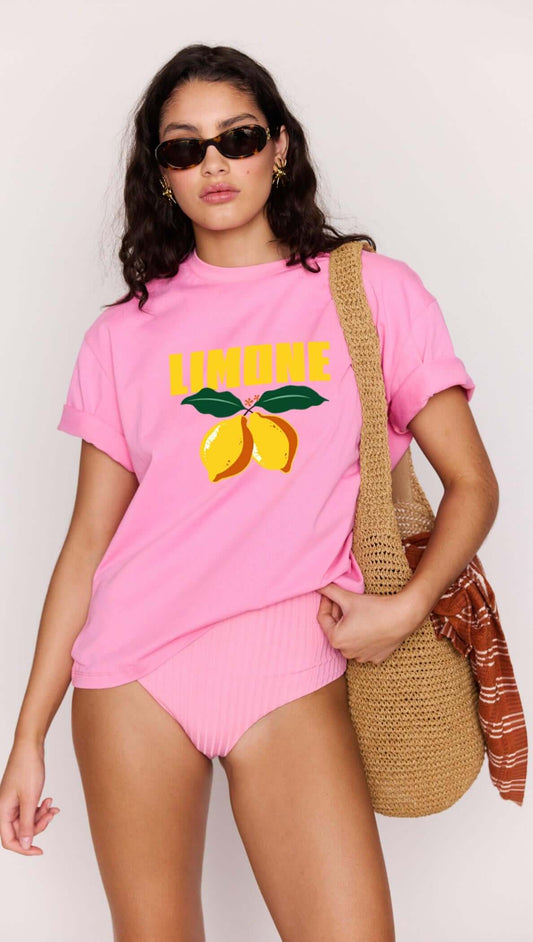 Model wearing a Pink Citrus Print Relaxed Oversized Cotton Tee with lemon graphic, perfect for summer vibes.