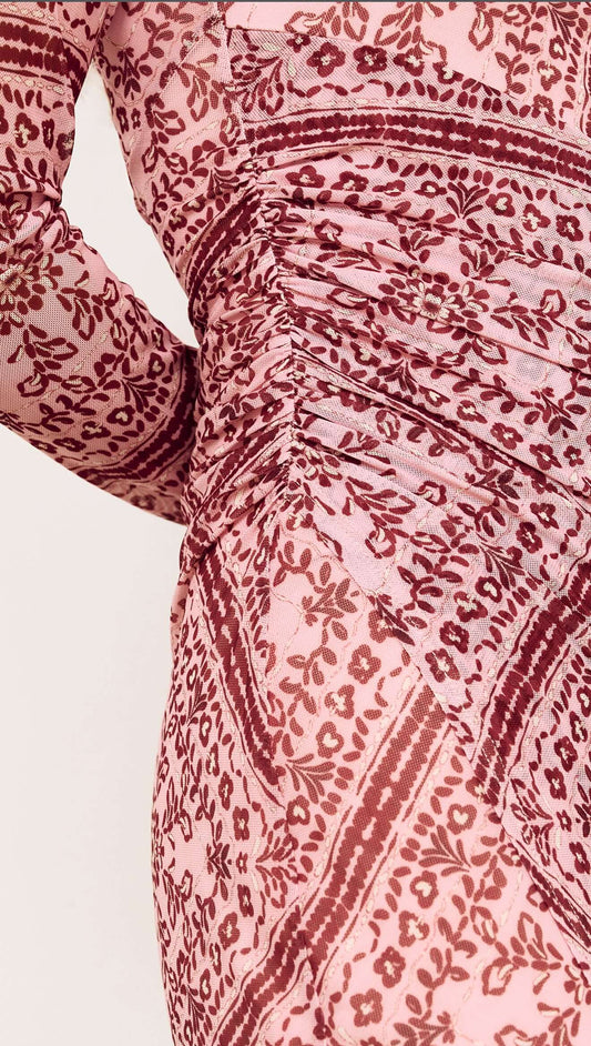 Close-up of the fabric details on the Pink Paisley Long Sleeve Mesh Midi Dress, showcasing its intricate paisley pattern.