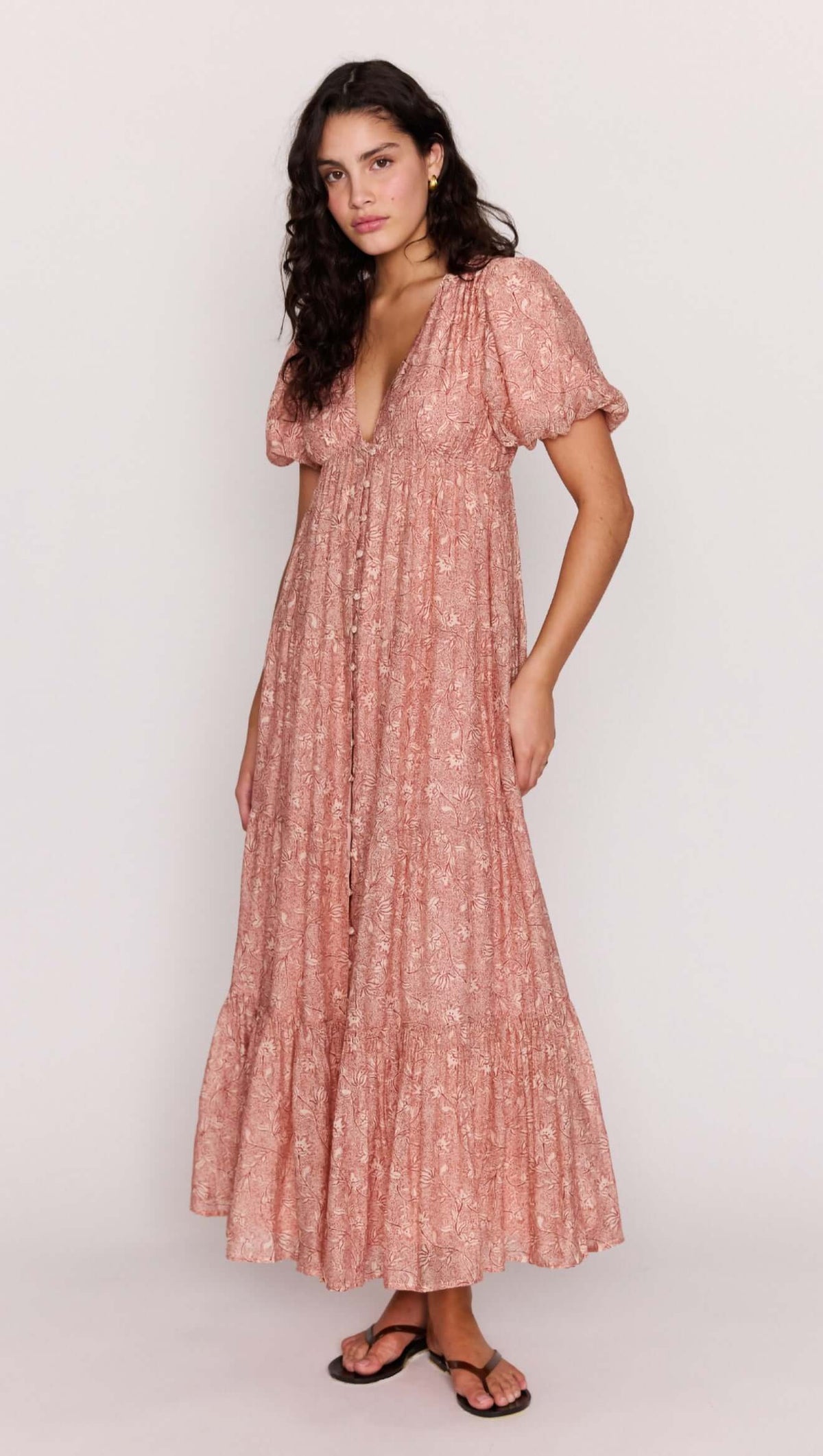 Red Floral Puff Sleeve Maxi Dress on a model, showcasing soft puff sleeves and a romantic tiered skirt.