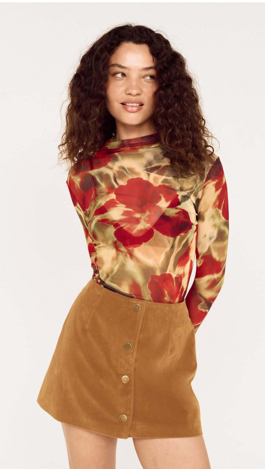 Model wearing a Red Floral Sheer Mesh High Neck Top paired with a stylish A-line skirt.