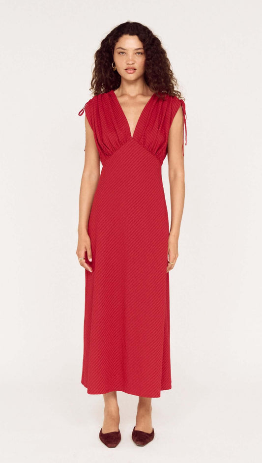 Red Stripe V-Neck Midi Dress with Gathered Shoulder modeled by a woman, featuring a bold design and elegant detail.