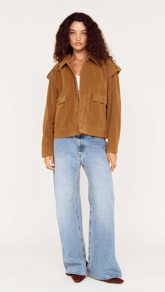 Model wearing a Relaxed Fit Faux Suede Jacket with wide-leg jeans against a neutral background.