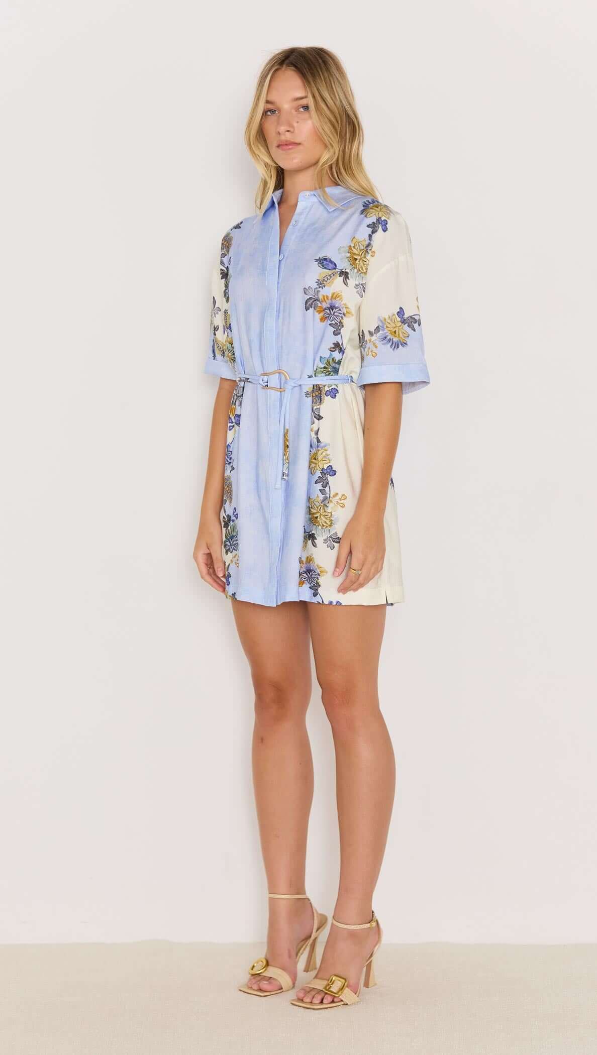 Lucia blue floral mini shirtdress with tie waist, featuring a relaxed fit and vibrant floral prints.