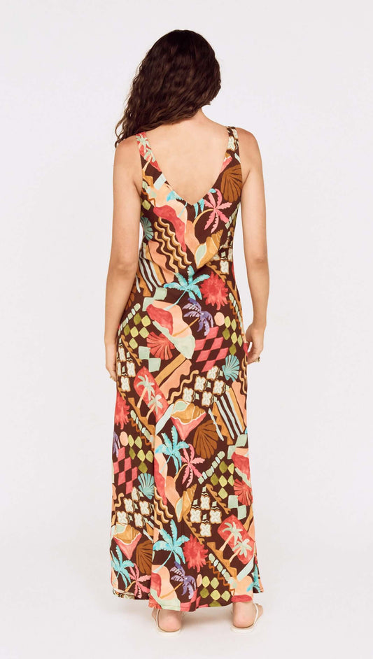 Back view of a woman wearing a Vintage Coastal Print Keyhole Midi Dress with vibrant patterns and a flowy design.