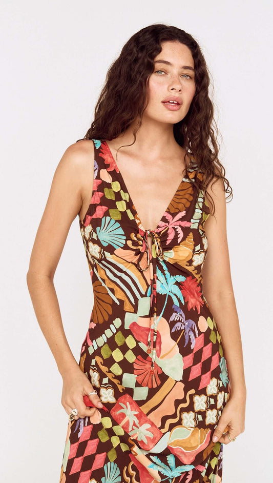 Model wearing a Vintage Coastal Print Keyhole Midi Dress with colorful patterns and a deep V-neckline.