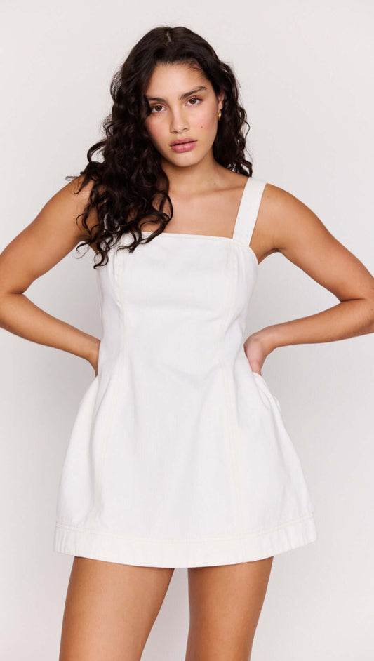 White Denim Square Neck Mini Dress on a model showcasing its structured design and square neckline.