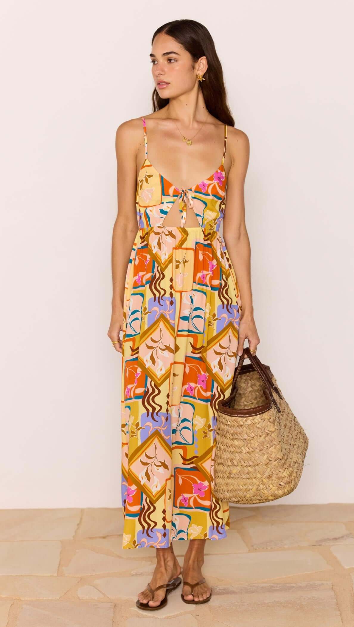 Bold Scarf Print Midi Dress With Cut Out worn by a model, featuring a vibrant abstract print and relaxed fit.