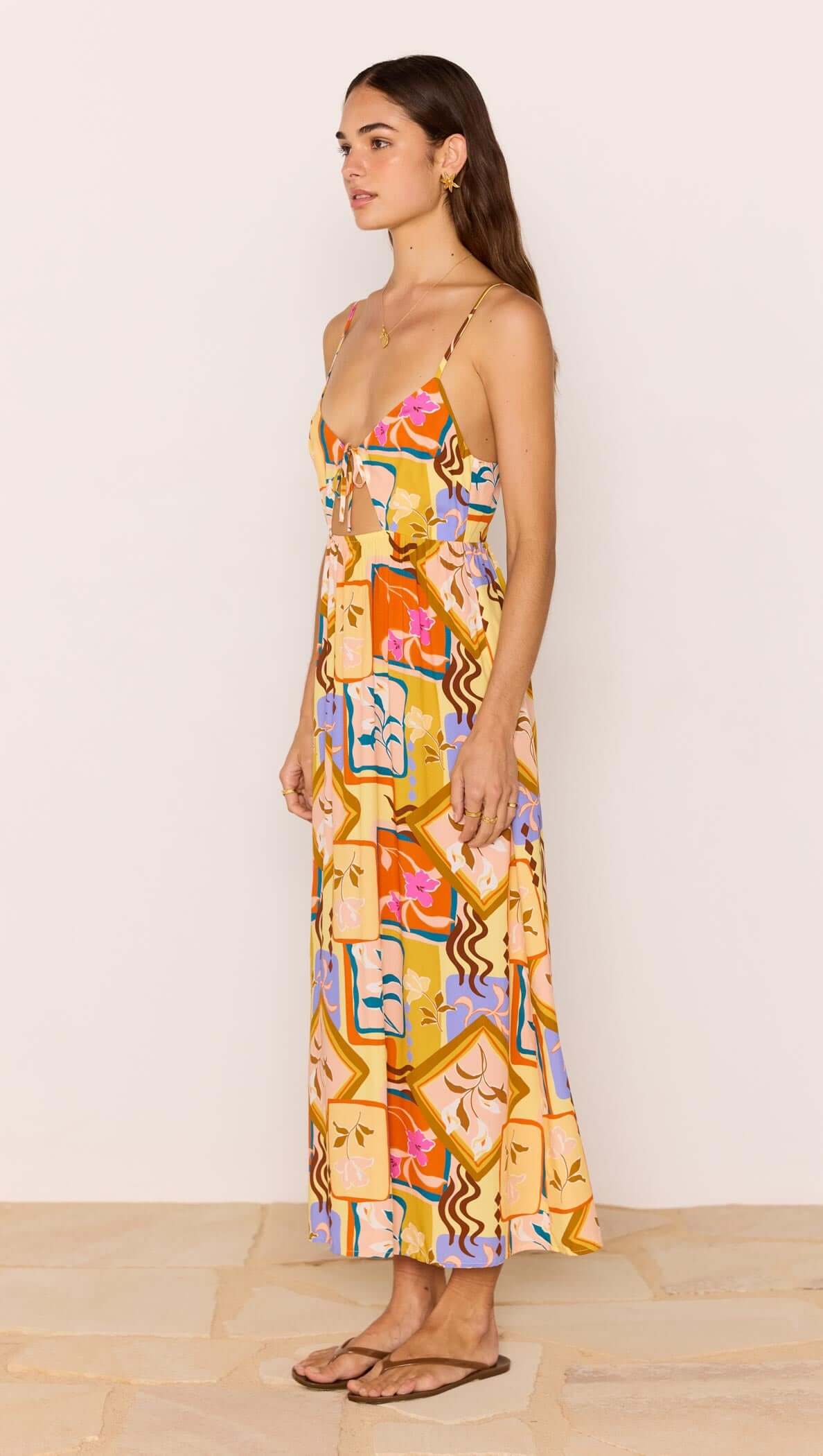 Bold Scarf Print Midi Dress With Cut Out displayed on a model, featuring a vibrant abstract print and relaxed fit.