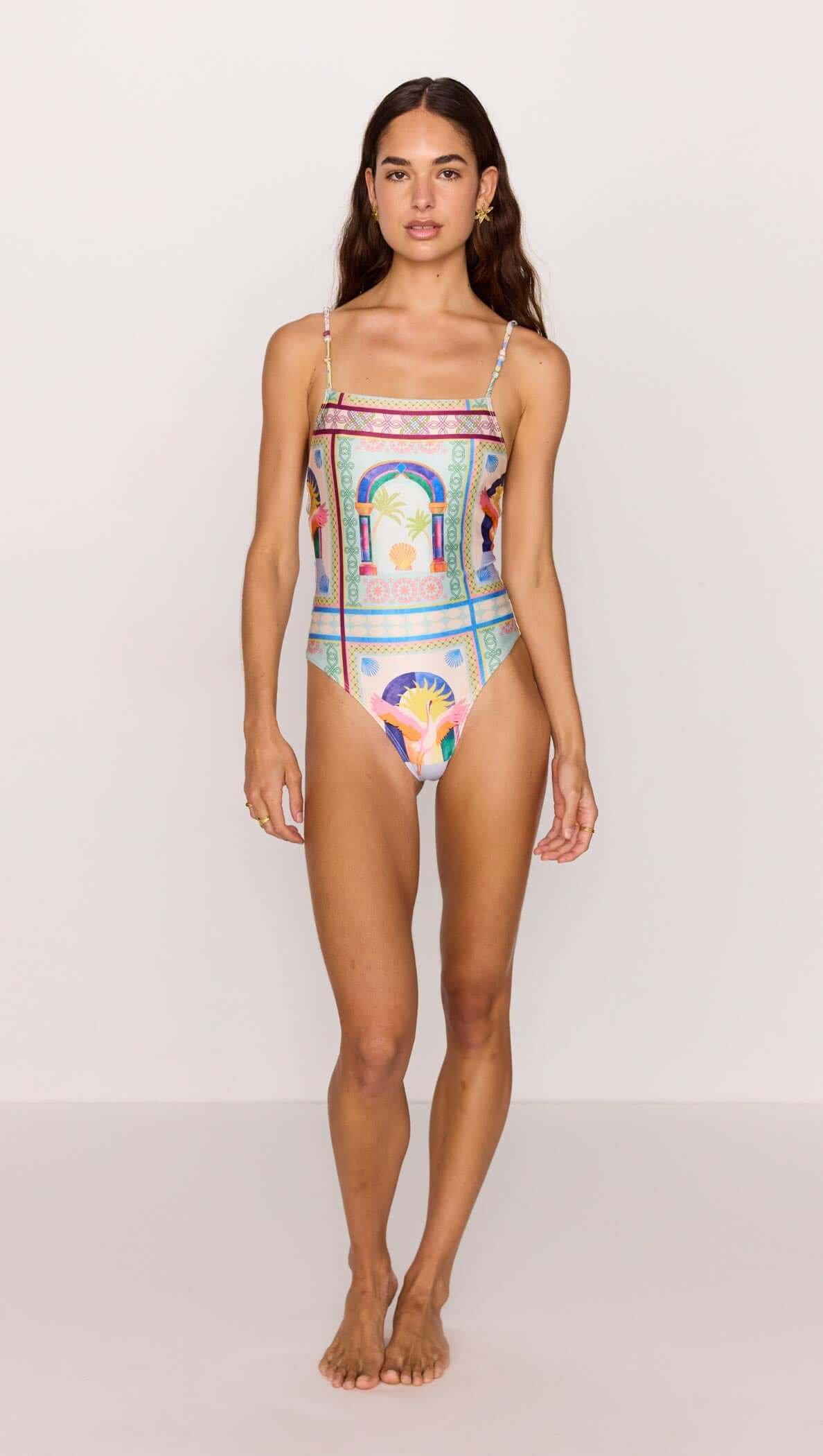 Scoop Back One Piece Swimsuit in vibrant multicolour print worn by model, showcasing a stylish and trendy beachwear design.