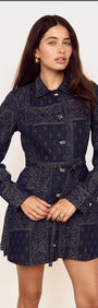 Model wearing a Paisley Jacquard Denim Shirt Dress with a collared neckline and removable waist tie.