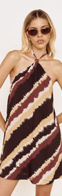 Halter Mini Dress in Abstract Stripe featuring a bold print with diagonal stripes in chocolate and burgundy tones.