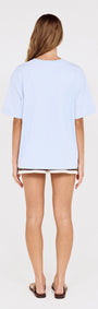 Relaxed Fit El Sol Print Tee in Pastel Blue worn from behind, featuring a soft light blue color and relaxed silhouette.
