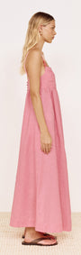 Rose Linen Blend Maxi Dress with Bead Detail in pink worn by model from the side, featuring a flowing skirt and adjustable straps.