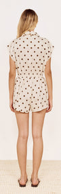Back view of Relaxed Fit Playsuit in Chocolate Spot, showcasing a soft cream base with chocolate spots.