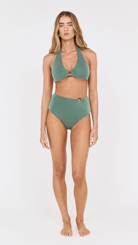 Green Textured Bikini Top with Ring Detail worn by model, showcasing halter neckline and unique ring detail.