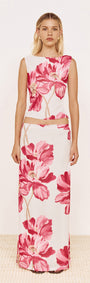 Pink Floral Mesh Top with Low Back worn with coordinating skirt, showcasing bold pink floral print design.